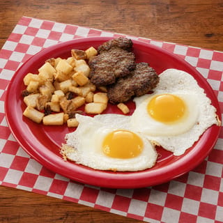2 Eggs, Hash Browns, Bacon or Sausage & Toast